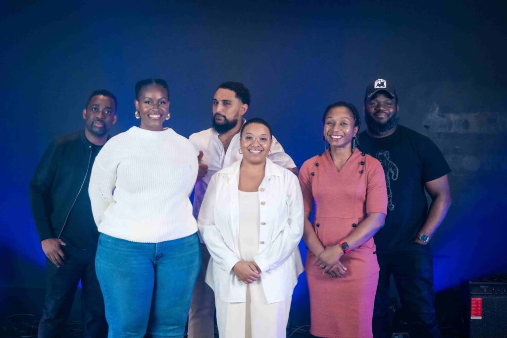 The Realms of Glory worship team gathered together after a Sunday service